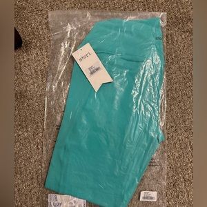 STORI by Katy Hearn
Pool Blue Icon Tight